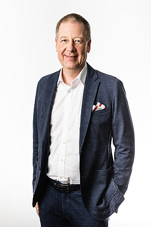 Portrait von Herrn Michael Schlögl.